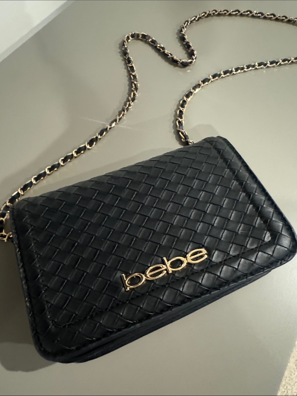 bebe Black Woven Crossbody with Gold Chain and Logo